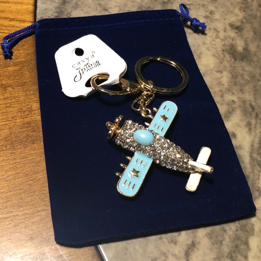 🌸Beautiful airplane rhino stone key chain/charm